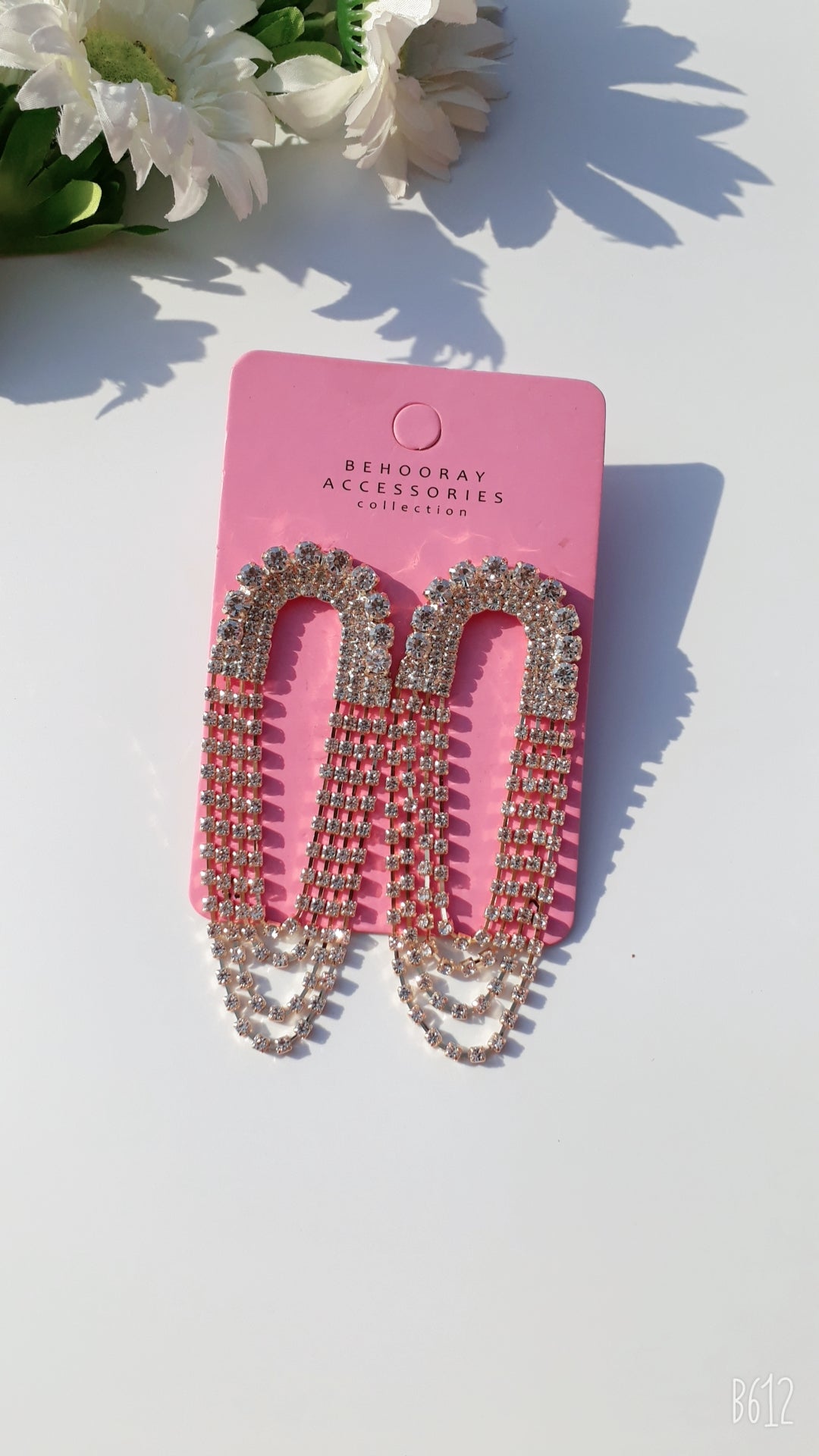 A Layer After Layer Crystal Earrings In Golden