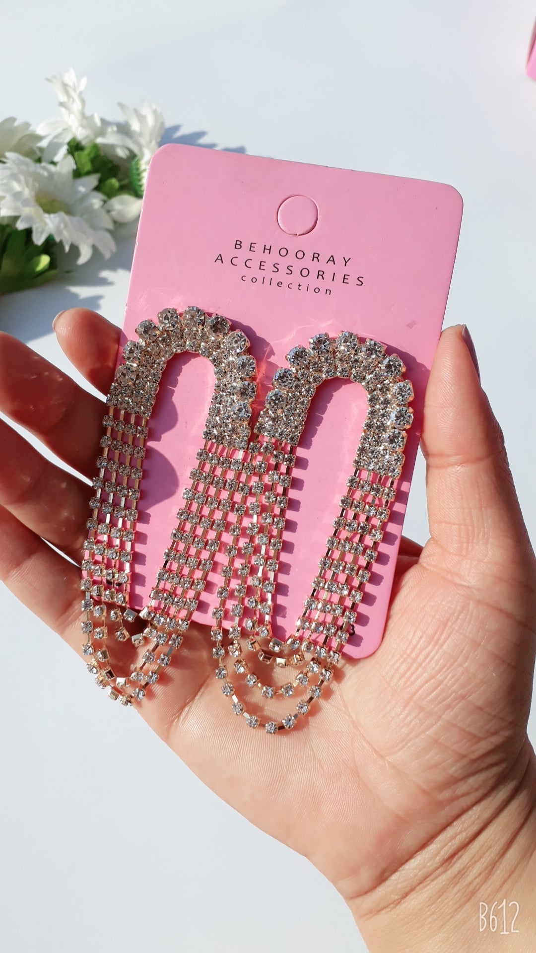 A Layer After Layer Crystal Earrings In Golden